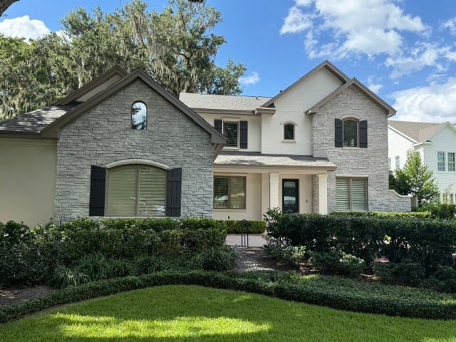 Repainted stone and stucco two-story home in Central Florida