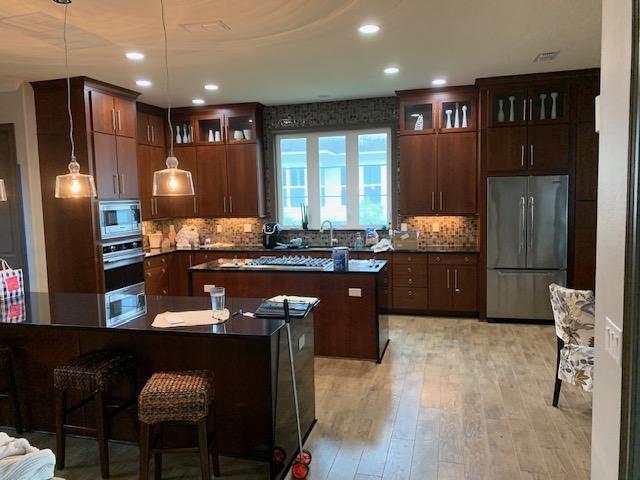 Cherry kitchen cabinets before refinishing