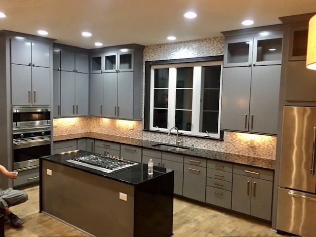 Refinished gray kitchen cabinets