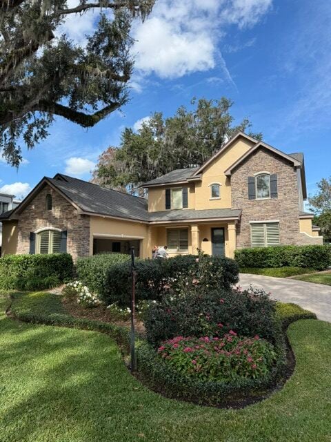 Stone and stucco two-story home exterior