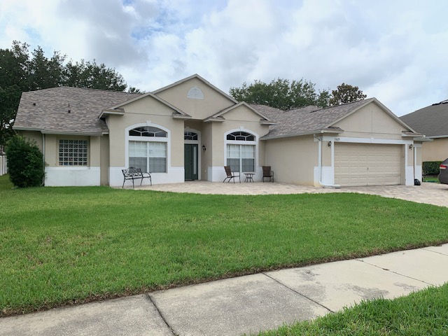 Stucco ranch home washed and repainted